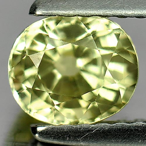 Natural Yellow Chrysoberyl Gemstones 1.19 Ct. Oval Shape 6.2 x 5.4 Mm.: Product ID: 801701118 Product Name: Natural Chrysoberyl Weight: 1.19 CT. Size: 6.2 x 5.4 x 4.4 MM. Shape: Oval Color: Yellow Clarity:VSI Luster: Good Gems Origin: Madagascar Treatment: Unheated Crysta
