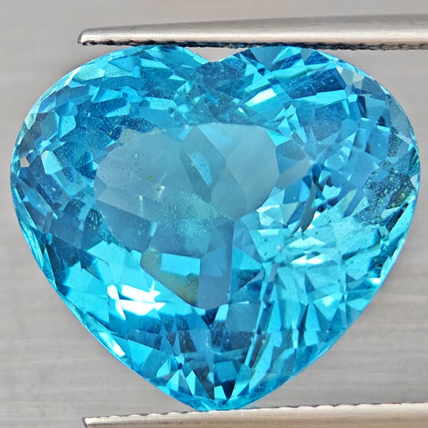 Natural Baby Blue Color Topaz Gemstones 21.09 Ct. Heart Shape 17.3 x 15.5 Mm.: Product ID: 807168499 Product Name: Natural Blue Topaz Weight: 21.09 CT. Size: 17.3 x 15.5 x 11 MM. Shape: Heart Shape Color: Baby Blue Color Clarity:VVS Luster: Very Good Gems Origin: Brazil Treatmen