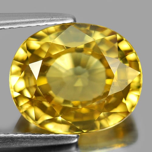 Natural Yellow Zircon Gemstones 9.18 Ct. Clean Oval Shape 12.4 x 10 Mm.: Product ID: 807730626 Product Name: Natural Zircon Weight: 9.18 CT. Size: 12.4 x 10 x 6.1 MM. Shape: Oval Color: Yellow Clarity:IF Luster: Very Good Gems Origin: Cambodia Treatment: heated Crystal Str