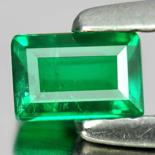Natural Green Emerald Gemstones 0.24 Ct. Baguette Shape 4.6 x 3.1 Mm.: Product ID: 802401216 Product Name: Natural Emerald Weight: 0.24 CT. Size: 4.6 x 3.1 x 2.1 MM. Shape: Baguette Color: Green Clarity:SI Luster: Good Gems Origin: Columbia Treatment: Unheated Crystal St