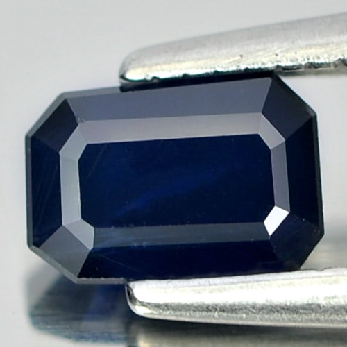 Natural Blue Sapphire Gemstones 0.64 Ct. Octagon Shape 5.8 x 4.1 Mm.: Product ID: 806008672 Product Name: Natural Blue Sapphire Weight: 0.64 CT. Size: 5.8 x 4.1 x 3 MM. Shape: Octagon Color: Blue Clarity:VSI Luster: Good Gems Origin: Thailand Treatment: Heated Crystal S