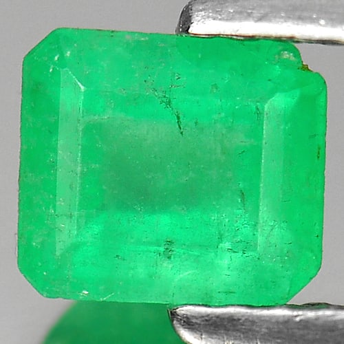 Natural Green Emerald Gemstones 0.66 Ct. Octagon Shape 5.8 x 5.1 Mm.: Product ID: 802402222 Product Name: Natural Emerald Weight: 0.66 CT. Size: 5.8 x 5.1 x 3.3 MM. Shape: Octagon Color: Green Clarity:VSI Luster: Good Gems Origin: Columbia Treatment: Unheated Crystal St
