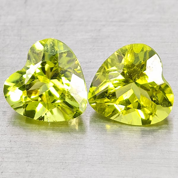 Natural Green Peridot Gemstones 1.73 Ct. 2 Pcs. Heart Shape 6 x 6 Mm.: Product ID: 805317325 Product Name: Natural Peridot Weight: 1.73 CT. Size: 6 x 6 x 4 MM. Shape: Heart Shape Color: Green Clarity:VSI - SI1 Luster: Good Gems Origin: Pakistan Treatment: Unheated Crysta