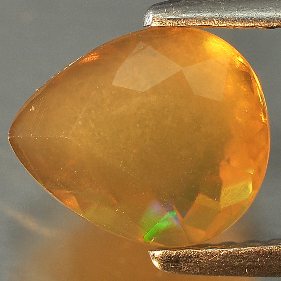 Natural Multi Color Opal Gemstones 1.50 Ct. Pear Shape 9 x 7.7 Mm.: Product ID: 818709751 Product Name: Natural Opal Weight: 1.50 CT. Size: 9 x 7.7 x 5.5 MM. Shape: Pear Color: Multi Color Clarity:Opaque Luster: Good Gems Origin: Ethiopia Treatment: Unheated Crystal S