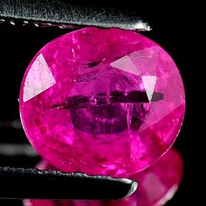 Natural Purplish Pink Ruby Gemstones 0.83 Ct. Oval Shape 6 x 5.4 Mm.: Product ID: 805927017 Product Name: Natural Ruby Weight: 0.83 CT. Size: 6 x 5.4 x 2.9 MM. Shape: Oval Color: Purplish Pink Clarity:VSI Luster: Good Gems Origin: Tanzania Treatment: Unheated Crystal St
