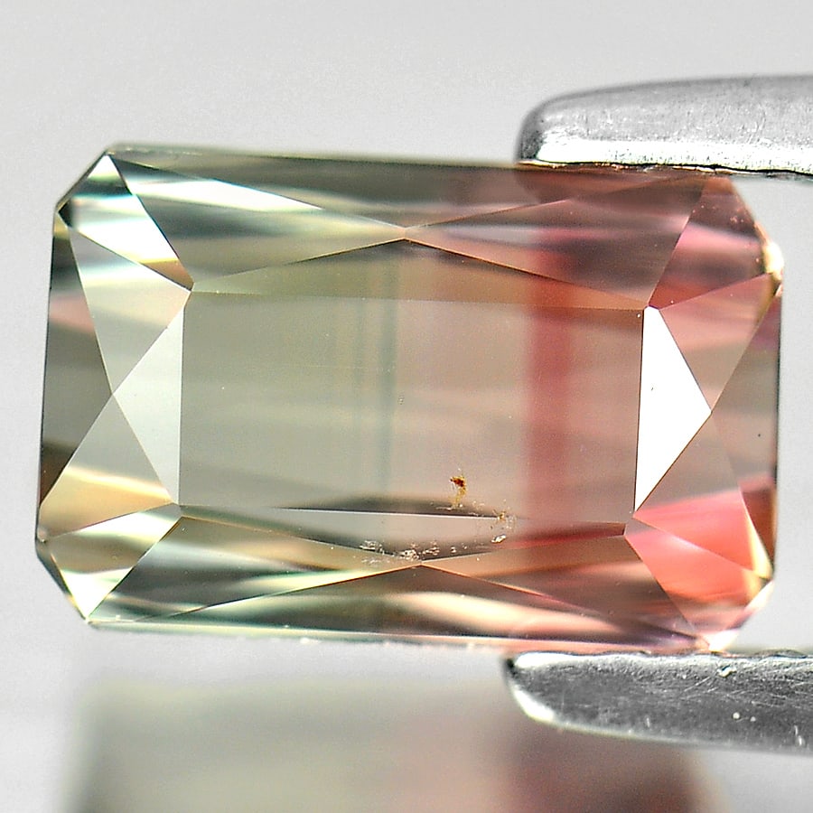 Natural Bi Color Tourmaline Gemstones 1.81 Ct. Octagon Shape 8.4 x 5.5 Mm.: Product ID: 807238037 Product Name: Natural Tourmaline Weight: 1.81 CT. Size: 8.4 x 5.5 x 4.2 MM. Shape: Octagon Color: Bi Color Clarity:VSI Luster: Very Good Gems Origin: Nigeria Treatment: Unheated 