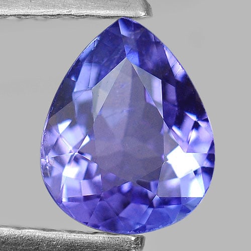 Natural Violetish Blue Tanzanite Gemstones 0.79 Ct. Pear Shape 6.9 x 5.6 Mm.: Product ID: 807004052 Product Name: Natural Tanzanite Weight: 0.79 CT. Size: 6.9 x 5.6 x 3.2 MM. Shape: Pear Color: Blue Clarity:VSI Luster: Very Good Gems Origin: Tanzania Treatment: Heated Crystal S