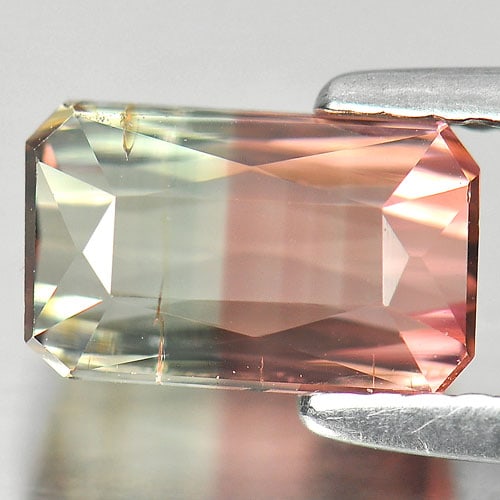 Natural Bi Color Tourmaline Gemstones 2.07 Ct. Octagon Shape 8.7 x 5.3 Mm.: Product ID: 807238060 Product Name: Natural Tourmaline Weight: 2.07 CT. Size: 8.7 x 5.3 x 4.7 MM. Shape: Octagon Color: Bi Color Clarity:VSI Luster: Good Gems Origin: Nigeria Treatment: Unheated Cryst