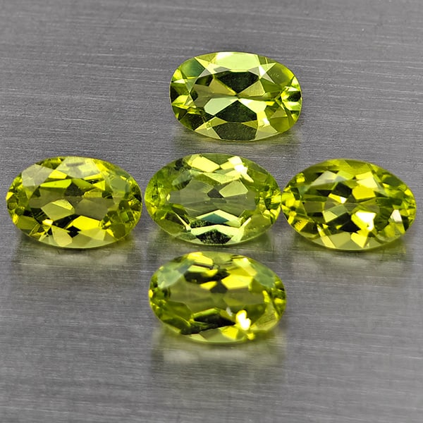 Natural Green Peridot Gemstones 2.94 Ct. 5 Pcs. Oval Shape 6.3 x 4.2 Mm.: Product ID: 805317750 Product Name: Natural Peridot Weight: 2.94 CT. Size: 6.3 x 4.2 x 3.4 MM. Shape: Oval Shape Color: Green Clarity:VSI Luster: Good Gems Origin: Pakistan Treatment: Unheated Crystal