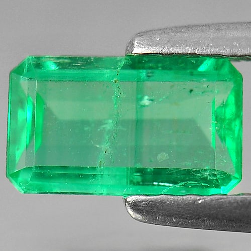 Natural Green Emerald Gemstones 0.71 Ct. Octagon Shape 7.6 x 4.5 Mm.: Product ID: 802402053 Product Name: Natural Emerald Weight: 0.71 CT. Size: 7.6 x 4.5 x 2.6 MM. Shape: Octagon Color: Green Clarity:VSI Luster: Good Gems Origin: Columbia Treatment: Unheated Crystal St