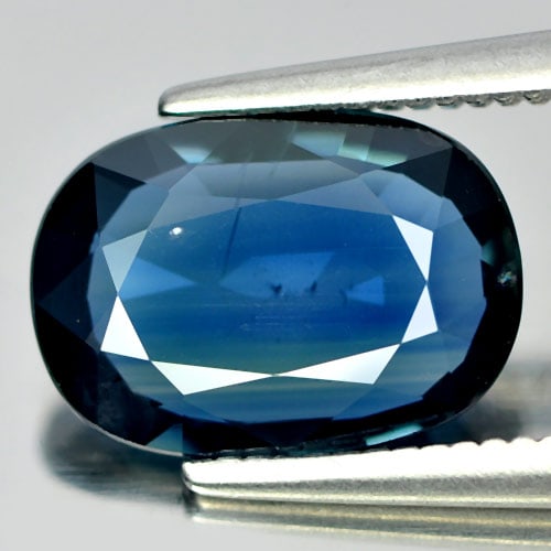Natural Blue Sapphire Gemstones 2.13 Ct. Oval Shape 10 x 7.1 Mm.: Product ID: 806008659 Product Name: Natural Blue Sapphire Weight: 2.13 CT. Size: 10 x 7.1 x 2.6 MM. Shape: Oval Color: Blue Clarity:VSI Luster: Good Gems Origin: Thailand Treatment: Heated Crystal Str
