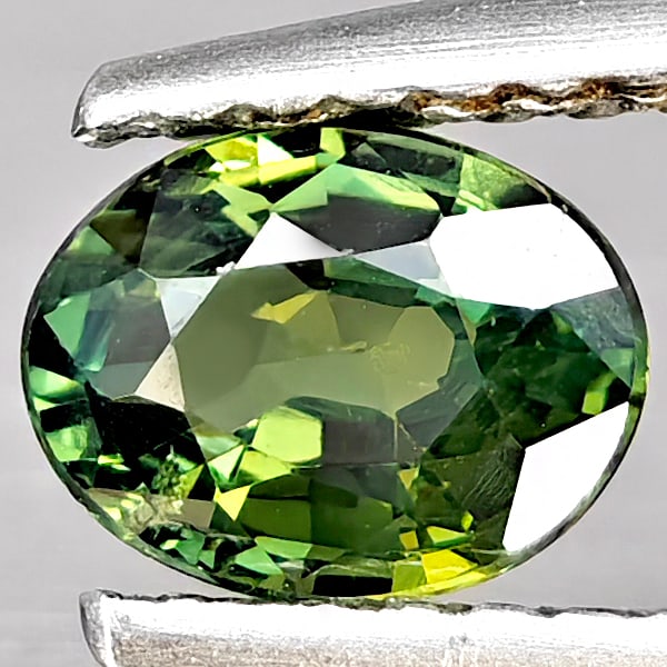 Natural Green Sapphire Gemstones 0.70 Ct. Oval Shape 6 x 4.6 Mm.: Product ID: 806162981 Product Name: Natural Green Sapphire Weight: 0.70 CT. Size: 6 x 4.6 x 3 MM. Shape: Oval Shape Color: Green Clarity:SI1 Luster: Good Gems Origin: Thailand Treatment: Heated Crysta