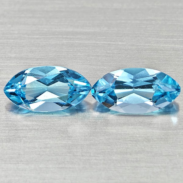 Natural Swiss Blue Topaz Gemstones 3.08 Ct. 2 Pcs. Marquise Shape 10.1 x 5.2 Mm.: Product ID: 807168179 Product Name: Natural Blue Topaz Weight: 3.08 CT. Size: 10.1 x 5.2 x 4 MM. Shape: Marquise Shape Color: Swiss Blue Clarity:VSI Luster: Good Gems Origin: Brazil Treatment: Treated