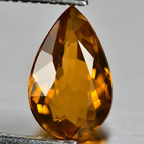 Natural Orange Tourmaline Gemstones 0.99 Ct. Pear Shape 8.6 x 5.5 Mm.: Product ID: 807243498 Product Name: Natural Tourmaline Weight: 0.99 CT. Size: 8.6 x 5.5 x 3.4 MM. Shape: Pear Color: Orange Clarity:VSI Luster: Good Gems Origin: Nigeria Treatment: Unheated Crystal St