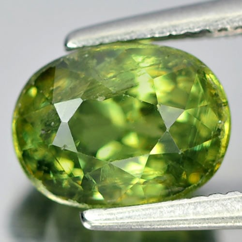 Natural Demantoid Garnet Gemstones 2.04 Ct. Oval Shape 7.6 x 5.8 Mm.: Product ID: 802922095 Product Name: Natural Demantoid Weight: 2.04 CT. Size: 7.6 x 5.8 x 5.2 MM. Shape: Oval Color: Green Clarity:SI1 Luster: Very Good Gems Origin: Mardagascar , Africa Treatment: Unh