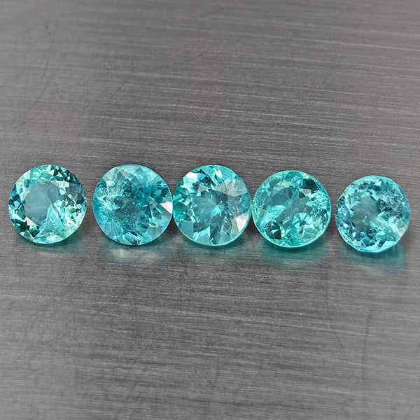 Natural Paraiba Color Apatite Gemstones 2.71 Ct. 5 Pcs. Round Shape 5.2 Mm.: Product ID: 800613770 Product Name: Natural Apatite Weight: 2.71 CT. Size: 5.2 x 5.2 x 3.5 MM. Shape: Round Color: Paraiba Color Clarity:SI1 Luster: Good Gems Origin: Tanzania Treatment: Unheated Crys