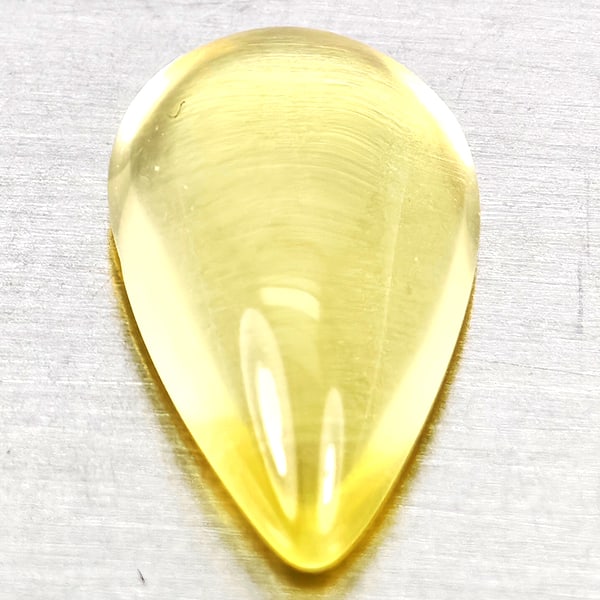 Natural Yellow Lemon Quartz Gemstones 3.14 Ct. Pear Cabochon Shape 13.4 x 8 Mm.: Product ID: 805530061 Product Name: Natural Quartz Weight: 3.14 CT. Size: 13.4 x 8 x 4.7 MM. Shape: Pear Cabochon Color: Yellow Clarity:None Luster: Good Gems Origin: Brazil Treatment: Unheated Crysta