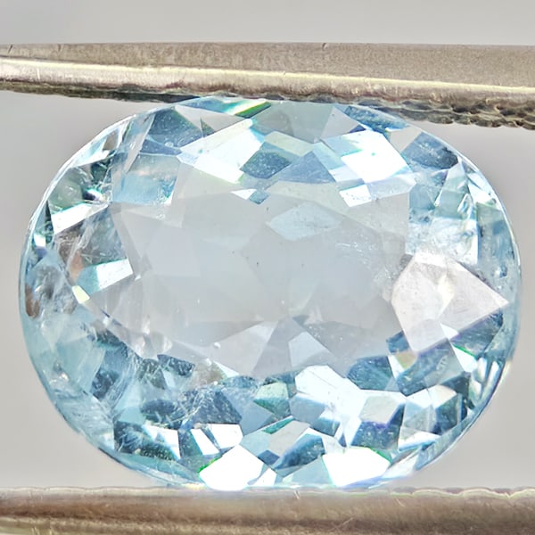 Natural Light Blue Aquamarine Gemstones 1.88 Ct. Oval Shape 9 x 7.5 Mm.: Product ID: 800812318 Product Name: Natural Aquamarine Weight: 1.88 CT. Size: 9 x 7.5 x 4.8 MM. Shape: Oval Color: Light Blue Clarity:VSI - SI1 Luster: Good Gems Origin: Brazil Treatment: Unheated Cry