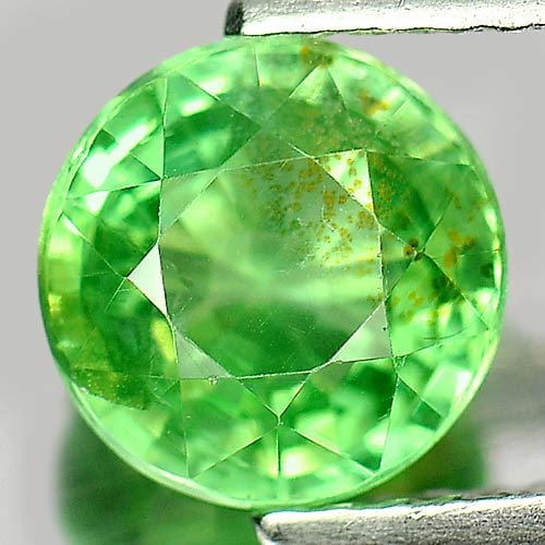 Natural Green Apatite Gemstones 1.75 Ct. Round Shape 7 Mm.: Product ID: 800608972 Product Name: Natural Apatite Weight: 1.75 CT. Size: 7 x 7 x 4.8 MM. Shape: Round Color: Green Clarity:SI Luster: Good Gems Origin: Tanzania Treatment: Unheated Crystal Structure