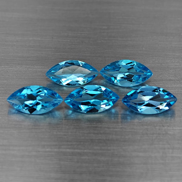 Natural Swiss Blue Topaz Gemstones 7.46 Ct. 5 Pcs. Marquise Shape 10 x 5.3 Mm.: Product ID: 807168718 Product Name: Natural Blue Topaz Weight: 7.46 CT. Size: 10 x 5.3 x 3.9 MM. Shape: Marquise Shape Color: Swiss Blue Clarity:VSI Luster: Good Gems Origin: Brazil Treatment: Treated