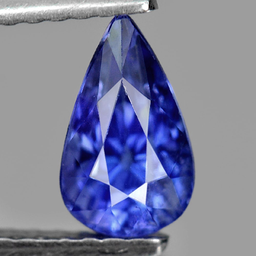 Natural Blue Tanzanite Gemstone 1.20 Ct. Pear Shape 8 x 4.8 Mm.: Product ID: 807009140 Product Name: Natural Tanzanite Weight: 1.20 CT. Size: 8 x 4.8 x 5 MM. Shape: Pear Color: Violet Blue Clarity:SI Luster: Good Gems Origin: Tanzania Treatment: Heated Crystal Stru