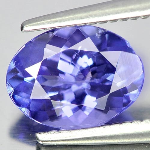 Natural Blue Tanzanite Gemstone 1.20 Ct. Oval Shape 7.9 x 6 Mm.: Product ID: 807009027 Product Name: Natural Tanzanite Weight: 1.20 CT. Size: 7.9 x 6 x 3.8 MM. Shape: Oval Color: Blue Clarity:VSI Luster: Good Gems Origin: Tanzania Treatment: Heated Crystal Structur