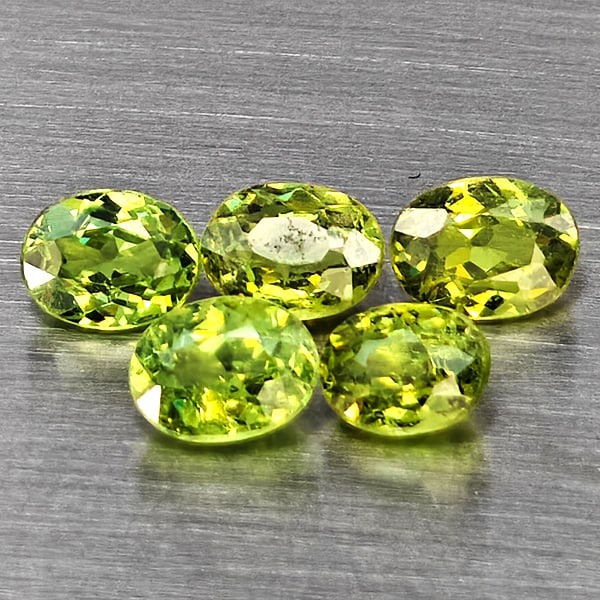 Natural Green Demantiod Garnet Gemstones 1.27 Ct. 5 Pcs. Oval Shape 4.2 x 3.2 Mm.: Product ID: 802937557 Product Name: Natural Demantoid Weight: 1.27 CT. Size: 4.2 x 3.2 x 2.1 MM. Shape: Oval Color: Green Clarity:SI1 Luster: Good Gems Origin: Madagascar Treatment: Unheated Crystal S