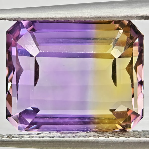 Natural Bi Color Ametrine Gemstones 6.42 Ct. Octagon Shape 11.6 x 9.8 Mm.: Product ID: 800408581 Product Name: Natural Ametrine Weight: 6.42 CT. Size: 11.6 x 9.8 x 7 MM. Shape: Octagon Color: Bi Color Clarity:VSI Luster: Good Gems Origin: Bolivia Treatment: Unheated Crystal 