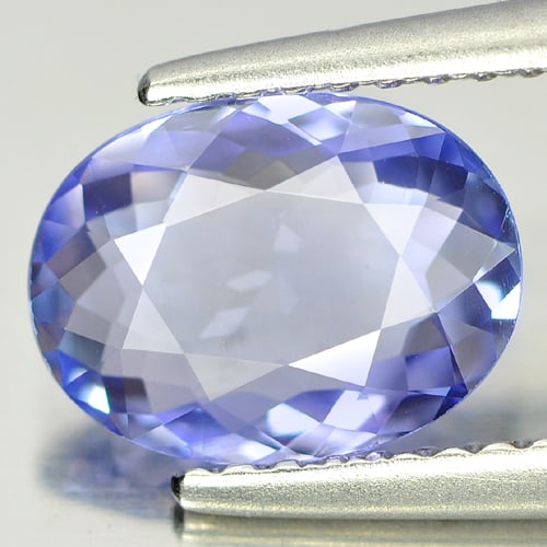 Natural Blue Tanzanite Gemstones 1.37 Ct. Clean Oval Shape 9 x 6.7 Mm.: Product ID: 807005405 Product Name: Natural Tanzanite Weight: 1.37 CT. Size: 9 x 6.7 x 2.8 MM. Shape: Oval Color: Violet Blue Clarity:IF Luster: Good Gems Origin: Tanzania Treatment: Heated Crystal St
