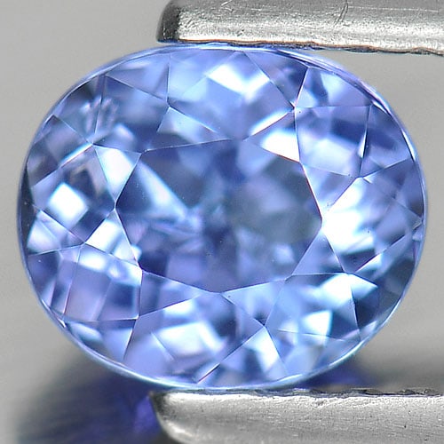 Natural Violet Blue Tanzanite Gemstones 0.85 Ct. Oval Shape 6 x 5.1 Mm.: Product ID: 807004788 Product Name: Natural Tanzanite Weight: 0.85 CT. Size: 6 x 5.1 x 3.9 MM. Shape: Oval Color: Violet Blue Clarity:VSI Luster: Good Gems Origin: Tanzania Treatment: Heated Crystal S