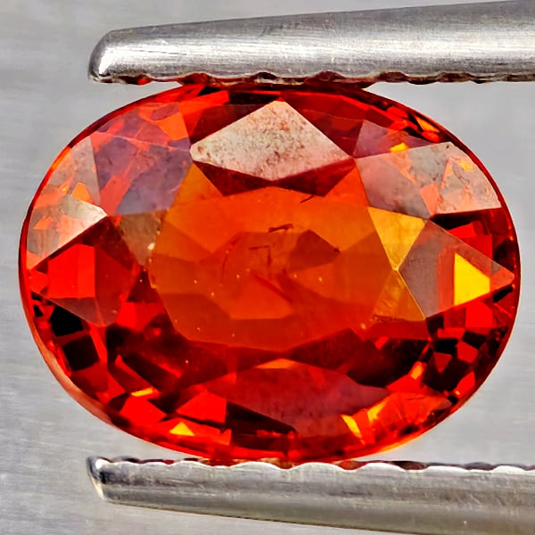Natural Orangish Red Spessartine Garnet Gemstones 1.12 Ct. Oval Shape 6.8 x 5.2 Mm.: Product ID: 802937216 Product Name: Natural Garnet Weight: 1.12 CT. Size: 6.8 x 5.2 x 3.3 MM. Shape: Oval Shape Color: Orangish Red Clarity:SI1 Luster: Good Gems Origin: Namibia Treatment: Unheated Cr