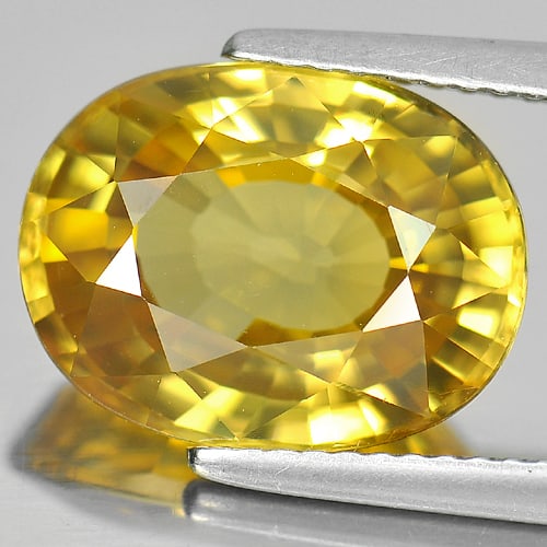 Natural Yellow Zircon Gemstones 9.37 Ct. Oval Shape 13.4 x 10.3 Mm.: Product ID: 807730619 Product Name: Natural Zircon Weight: 9.37 CT. Size: 13.4 x 10.3 x 6.3 MM. Shape: Oval Color: Yellow Clarity:VVS Luster: Good Gems Origin: Cambodia Treatment: Heated Crystal Struc