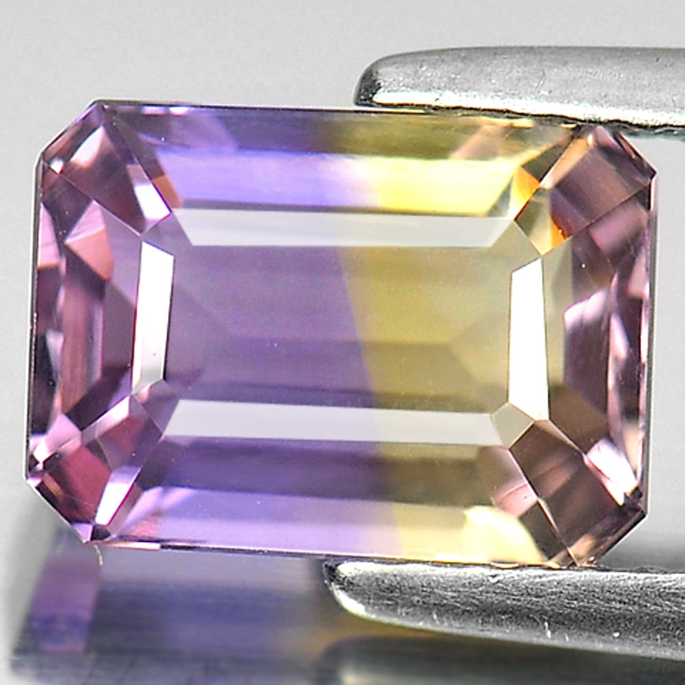 Natural Bi Color Ametrine Gemstones 2.68 Ct. Octagon Shape 9.6 x 7.1 Mm.: Product ID: 800405134 Product Name: Natural Ametrine Weight: 2.68 CT. Size: 9.6 x 7.1 x 5.7 MM. Shape: Octagon Color: Bi Color Clarity:VVS Luster: Good Gems Origin: Bolivia Treatment: Unheated Crystal
