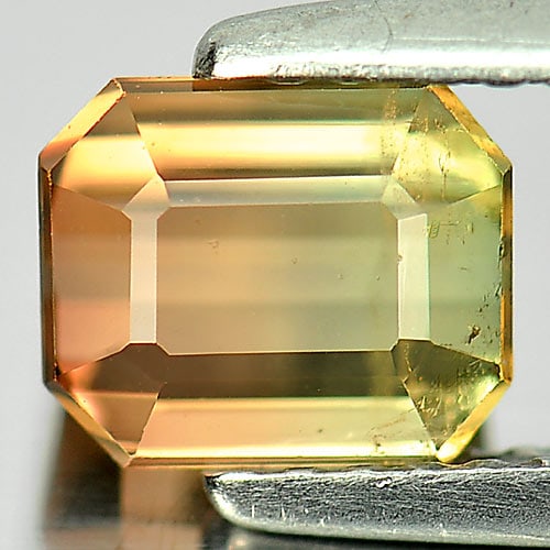 Natural Bi Color Tourmaline Gemstones 1.49 Ct. Octagon Shape 6.6 x 5.5 Mm.: Product ID: 807244022 Product Name: Natural Tourmaline Weight: 1.49 CT. Size: 6.6 x 5.5 x 4.4 MM. Shape: Octagon Color: Bi Color Clarity:VSI Luster: Good Gems Origin: Nigeria Treatment: Unheated Cryst