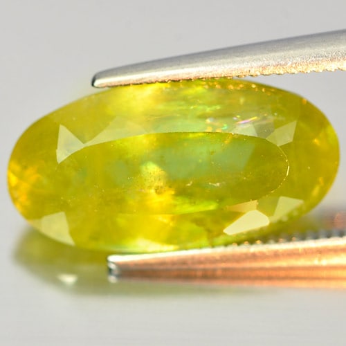 Natural Intense Green Sphene Gemstones 6.40 Ct. Oval Shape 15.7 x 8.2 Mm.: Product ID: 806504585 Product Name: Natural Sphene Weight: 6.40 CT. Size: 15.7 x 8.2 x 6.1 MM. Shape: Oval Color: Intense Green With Red Spark Clarity:SI Luster: Adamantine Gems Origin: Madagascar Tre