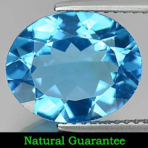 Natural Swiss Blue Topaz Gemstones 4.60 Ct. Oval Shape 12 x 10 Mm.: Product ID: 807161055 Product Name: Natural Blue Topaz Weight: 4.60 CT. Size: 12 x 10 x 5.2 MM. Shape: Oval Color: Swiss Blue Clarity:VVS Luster: Good Gems Origin: Brazil Treatment: Treated Crystal St
