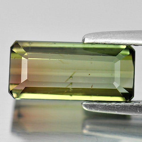 Natural Bi Color Tourmaline Gemstones 2.75 Ct. Octagon Shape 11.7 x 5.5 Mm.: Product ID: 807232446 Product Name: Natural Tourmaline Weight: 2.75 CT. Size: 11.7 x 5.5 x 4.2 MM. Shape: Octagon Color: Bi Color Clarity:VSI Luster: Good Gems Origin: Nigeria Treatment: Unheated Crys