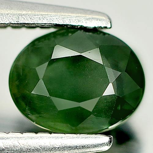 Natural Green Sapphire Gemstones 0.71 Ct. Oval Shape 5.8 x 4.5 Mm.: Product ID: 806157847 Product Name: Natural Green Sapphire Weight: 0.71 CT. Size: 5.8 x 4.5 x 3.1 MM. Shape: Oval Color: Green Clarity:VSI Luster: Good Gems Origin: Thailand Treatment: Heated Crystal 