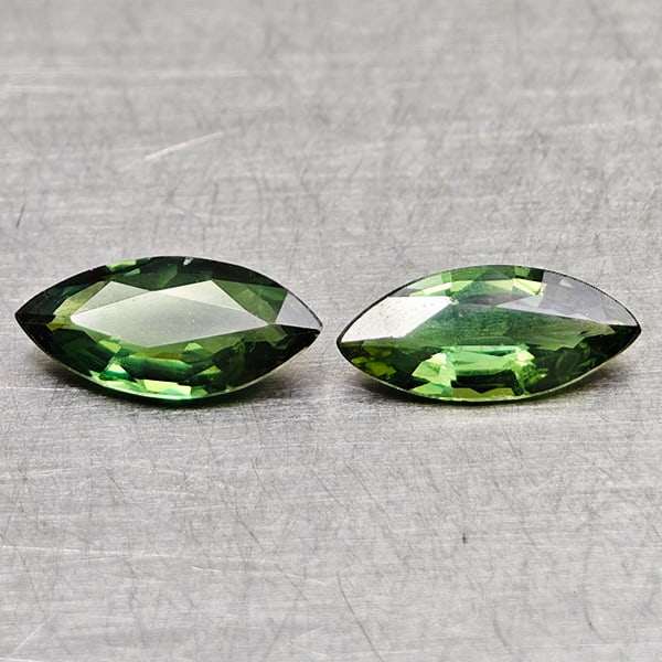 Natural Green Sapphire Gemstones 0.94 Ct. 2 Pcs. Marquise Shape 7.9 x 3.7 Mm.: Product ID: 806162007 Product Name: Natural Green Sapphire Weight: 0.94 CT. Size: 7.9 x 3.7 x 2 MM. Shape: Marquise Shape Color: Green Clarity:VSI Luster: Good Gems Origin: Thailand Treatment: Heated 