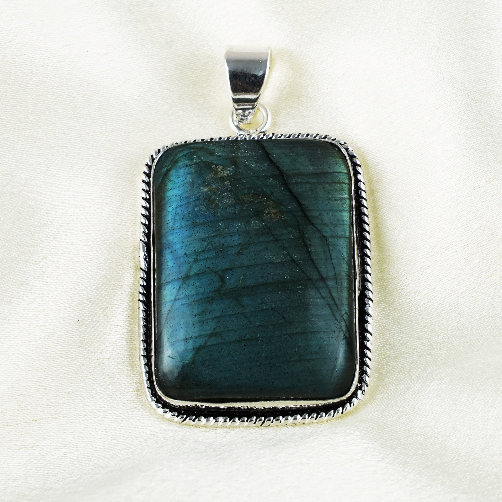 Natural Labradorite Silver Plated Handmade Pendant: Product ID: 260401134231 Product - Handmade Silver Plated Pendant Metal - 925 Sterling Silver Plated Pendant Size - 4x3 CM Gemstone - Labradorite Gemstone Origin - Canada Gemstone Shape - Square Penda