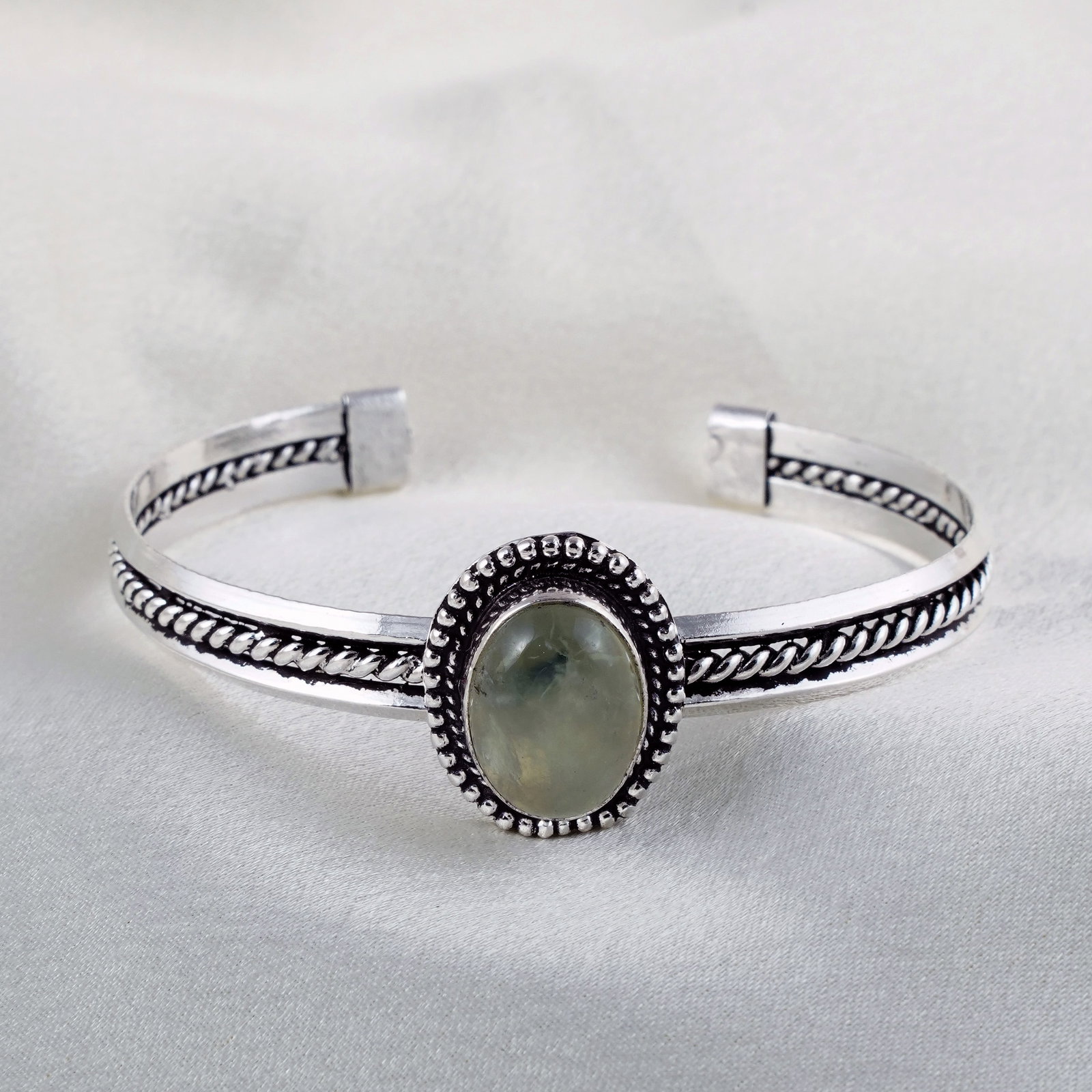 Natural Prehnite Silver Plated Handmade Cuff Bangle: Product ID: 260331133152 Product - Handmade Silver Plated Cuff Bangle Metal - 925 Sterling Silver Plated Bangle Size - 6.5x6 CM (Adjustable) Gemstone - Prehnite Gemstone Origin - South Africa Gemstone
