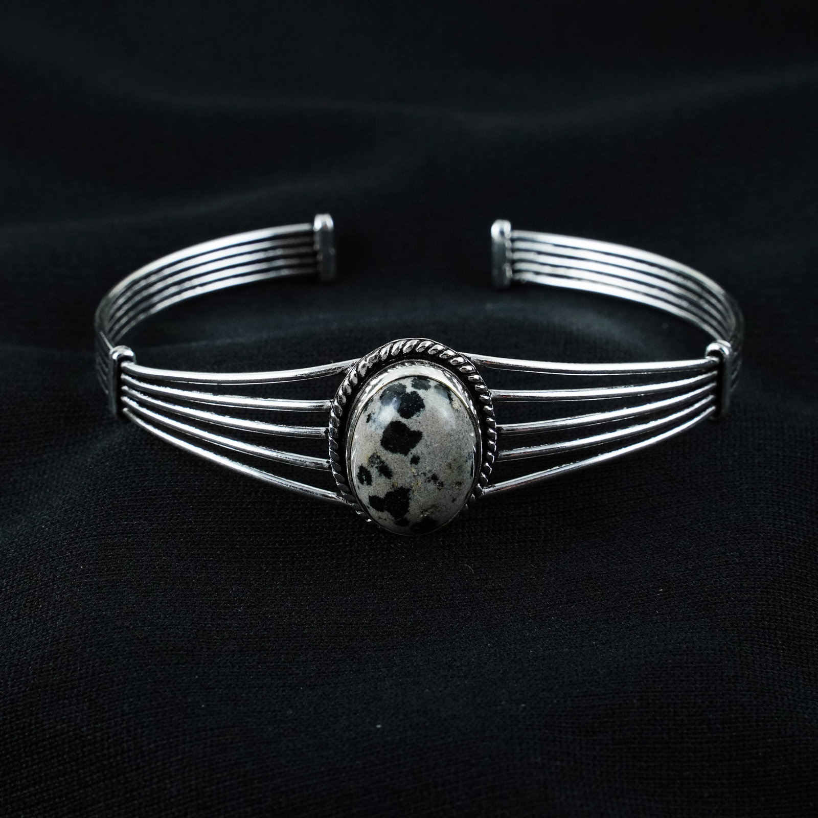 Natural Dalmatian Jasper Silver Plated Handmade Cuff Bangle: Product ID: 260404141759 Product - Handmade Silver Plated Cuff Bangle Metal - 925 Sterling Silver Plated Bangle Size - 6.5x5 CM (Adjustable) Gemstone - Dalmatian Jasper Gemstone Origin - Mexico Gemsto