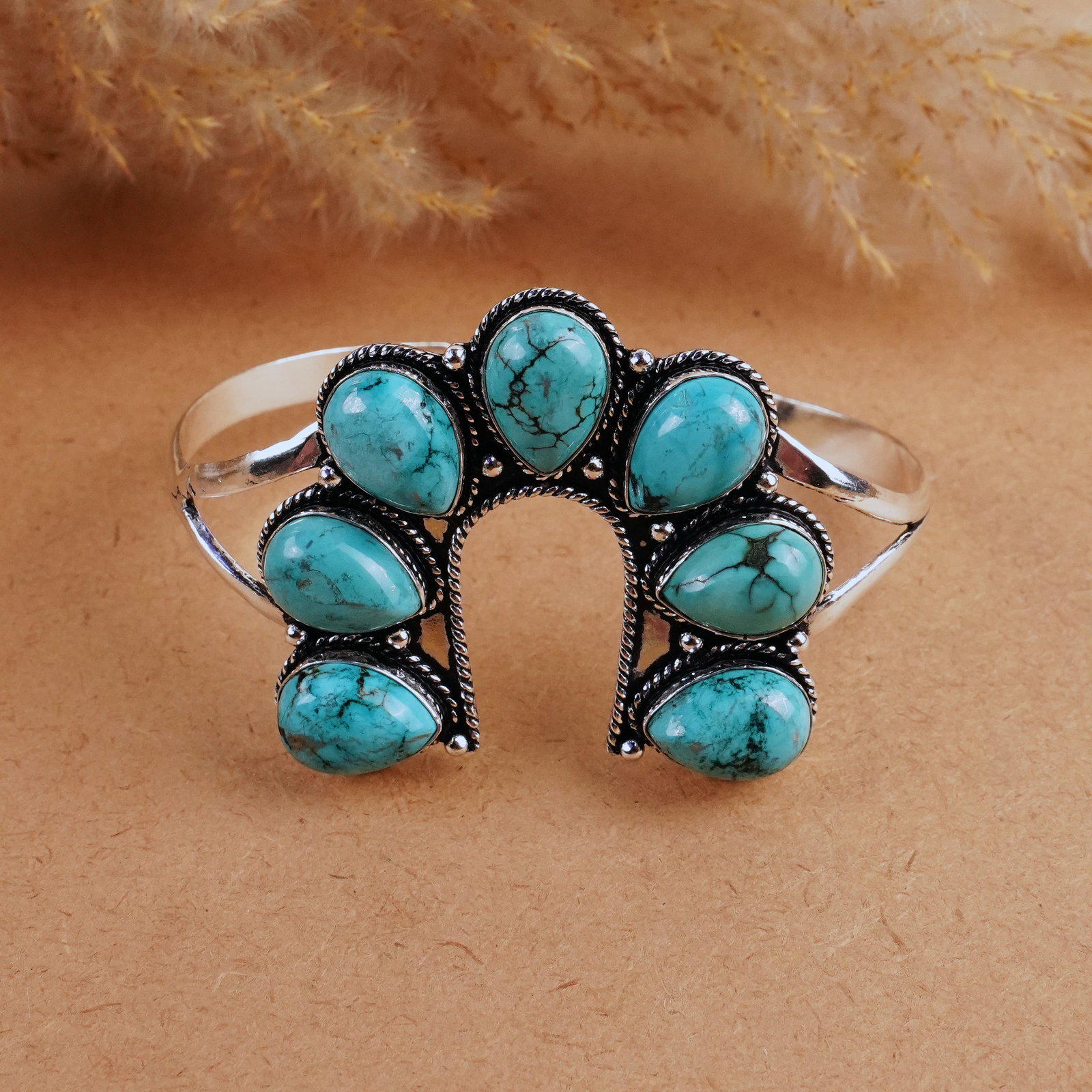 Natural Turquoise Silver Plated Handmade Cuff Bangle: Product ID: 260407183237 Product - Handmade Silver Plated Cuff Bangle Metal - 925 Sterling Silver Plated Bangle Size - 7x4.5 CM (Adjustable) Gemstone - Turquoise Gemstone Origin - Tibet Gemstone Size 