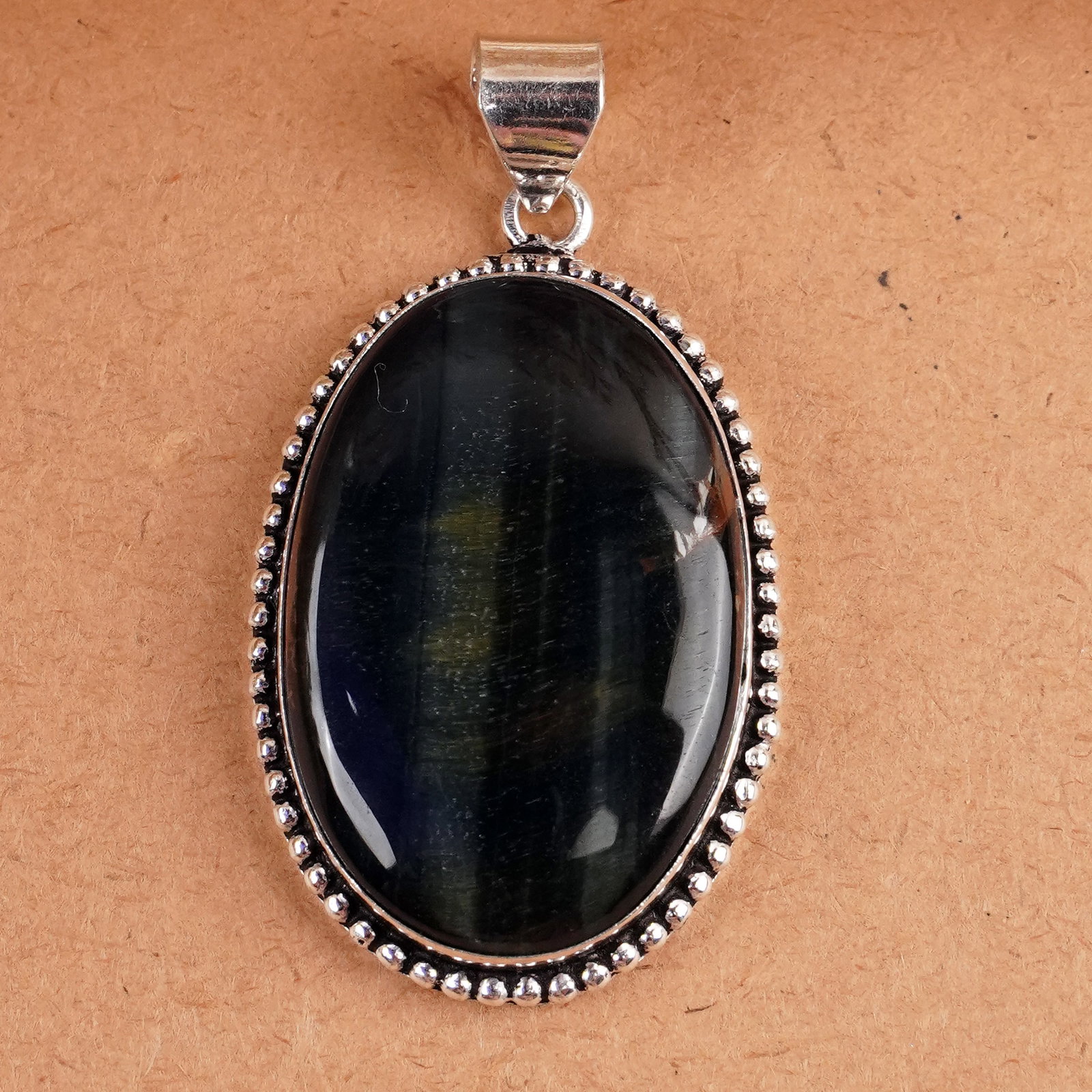 Natural Blue Tiger Eye Silver Plated Handmade Pendant: Product ID: 260407165357 Product - Handmade Silver Plated Pendant Metal - 925 Sterling Silver Plated Pendant Size - 4x3 CM Gemstone - Blue Tiger Eye Gemstone Origin - South Africa Gemstone Shape - Squ