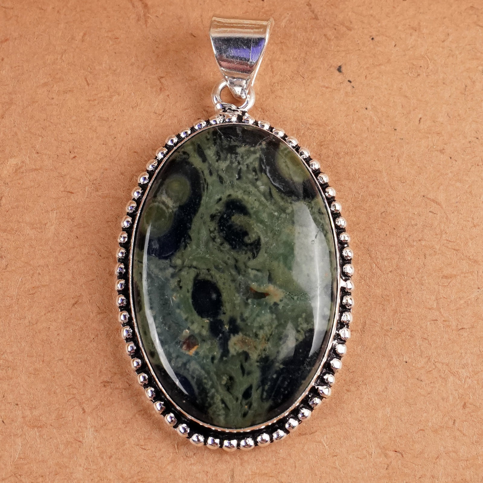 Natural Kambaba Jasper Silver Plated Handmade Pendant: Product ID: 260407164903 Product - Handmade Silver Plated Pendant Metal - 925 Sterling Silver Plated Pendant Size - 4x2.5 CM Gemstone - Kambaba Jasper Gemstone Origin - Madagascar Gemstone Shape - Ova