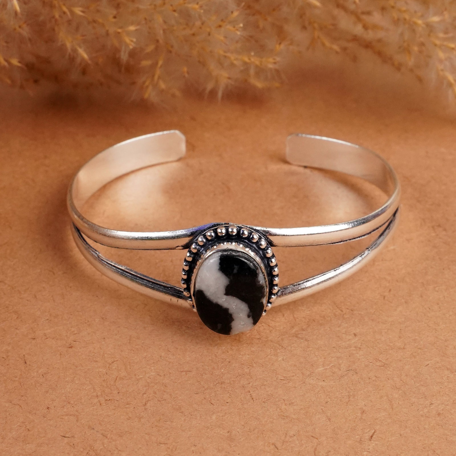 Natural Zebra Jasper Silver Plated Handmade Bangle: Product ID: 260408152344 Product - Handmade Silver Plated Cuff Bangle Metal - 925 Sterling Silver Plated Bangle Size - 6.5x5 CM (Adjustable) Gemstone - Zebra Jasper Gemstone Origin - Africa Gemstone S