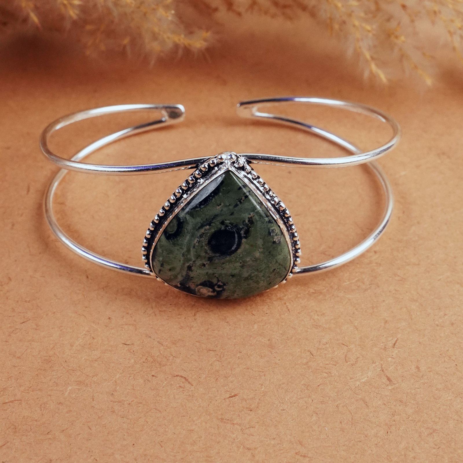 Natural Kambaba Jasper Silver Plated Handmade Bangle: Product ID: 260407190523 Product - Handmade Silver Plated Cuff Bangle Metal - 925 Sterling Silver Plated Bangle Size - 7x5 CM (Adjustable) Gemstone - Kambaba Jasper Gemstone Origin - Madagascar Gemsto