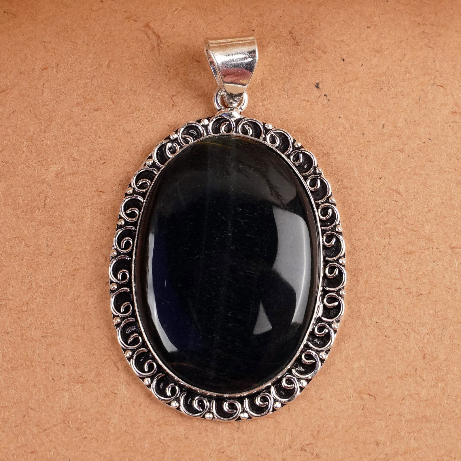 Natural Black Tiger Eye Silver Plated Handmade Pendant: Product ID: 260407164730 Product - Handmade Silver Plated Pendant Metal - 925 Sterling Silver Plated Pendant Size - 4.5x3.5 CM Gemstone - Black Tiger Eye Gemstone Origin - South Africa Gemstone Shape 