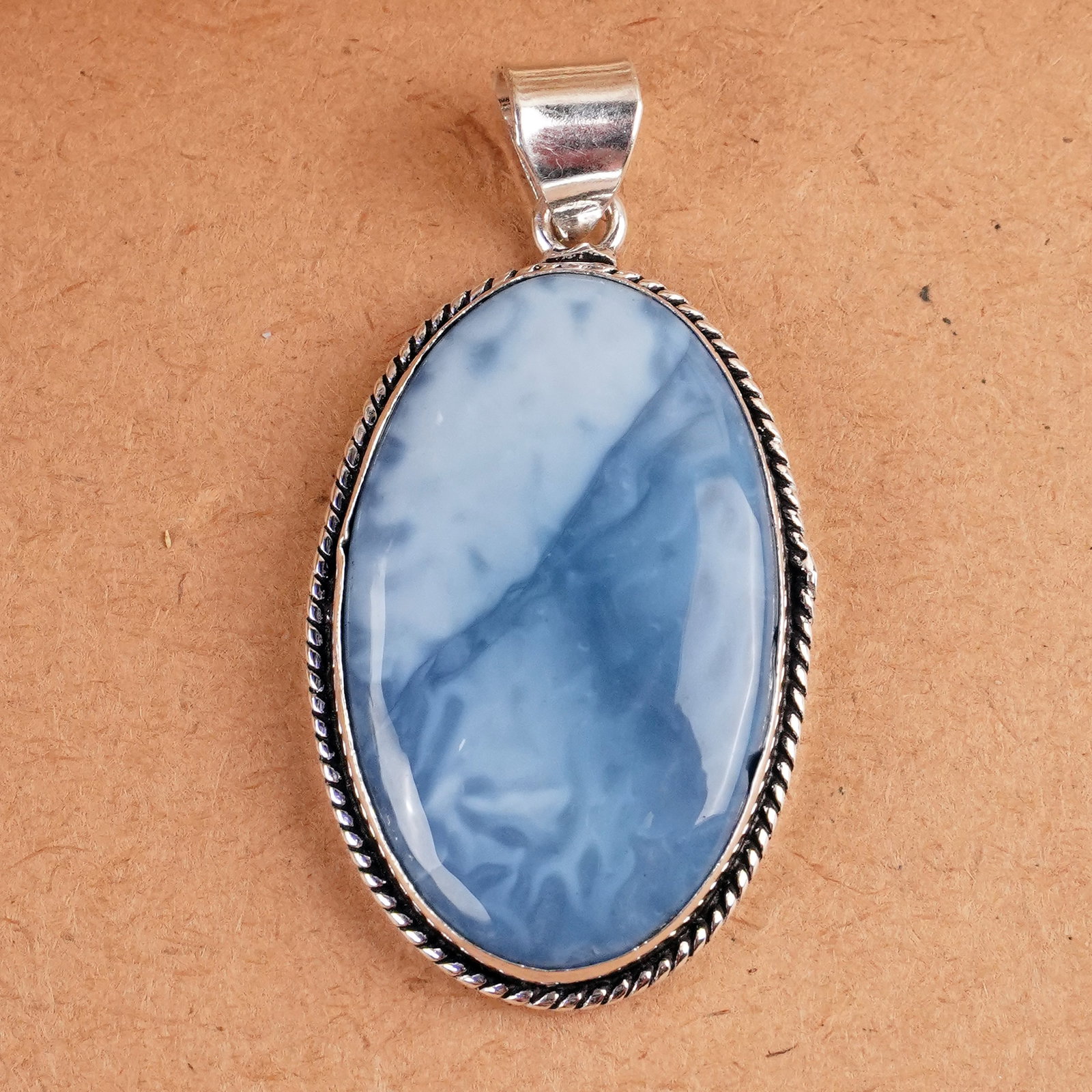 Natural Blue Opal Silver Plated Handmade Pendant: Product ID: 260407164528 Product - Handmade Silver Plated Pendant Metal - 925 Sterling Silver Plated Pendant Size - 4x2.5 CM Gemstone - Blue Opal Gemstone Origin - Indonesia Gemstone Shape - Oval Pend