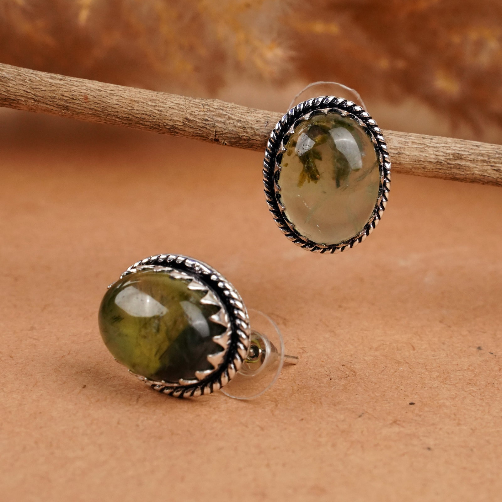 Natural Prehnite Silver Plated Handmade Stud Earring: Product ID: 260406130149 Product - Handmade Silver Plated Stud Earring Metal - 925 Sterling Silver Plated Earring Type - Stud Gemstone - Prehnite Gemstone Origin - South Africa Gemstone Size - 12X16 M